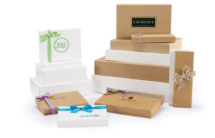 Standard 2 piece folding pop up apparel boxes in white and kraft. A great behind the counter retail store box for gift wrap service